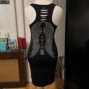 Custom made stretchy black dress w/slits all over and black &silver rhinestones